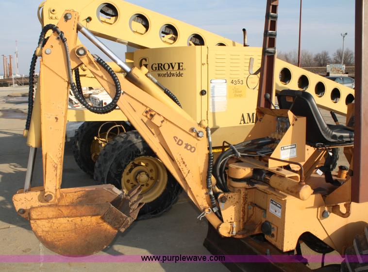 image for item 4893 Case 360 trencher backhoe