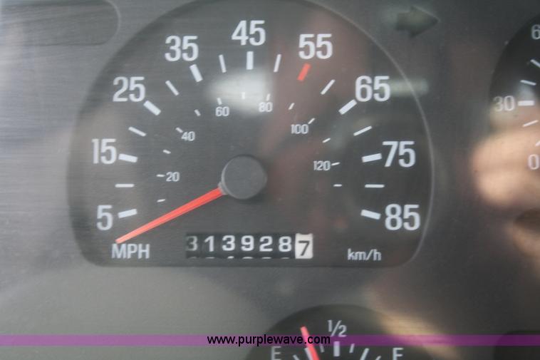 image for item 4948 2000 Sterling LT8500 rollback truck