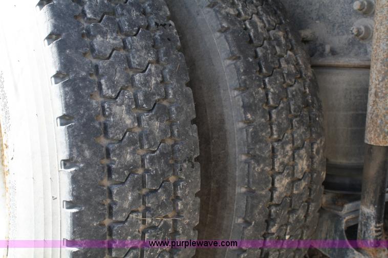 image for item 4948 2000 Sterling LT8500 rollback truck