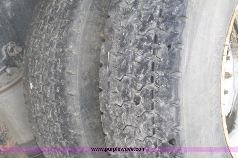 image for item 4948 2000 Sterling LT8500 rollback truck