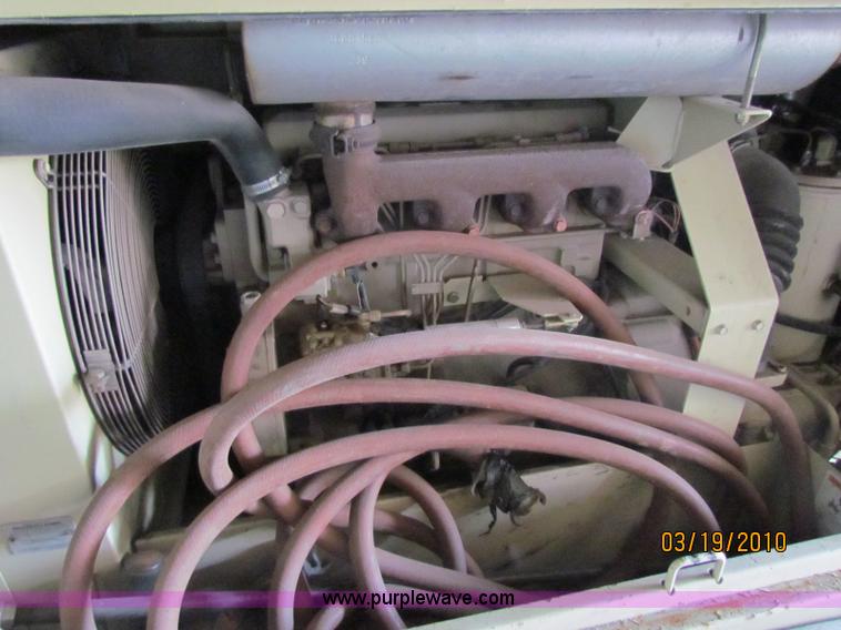 image for item 7502 1999 Ingersoll Rand P185WJD air compressor