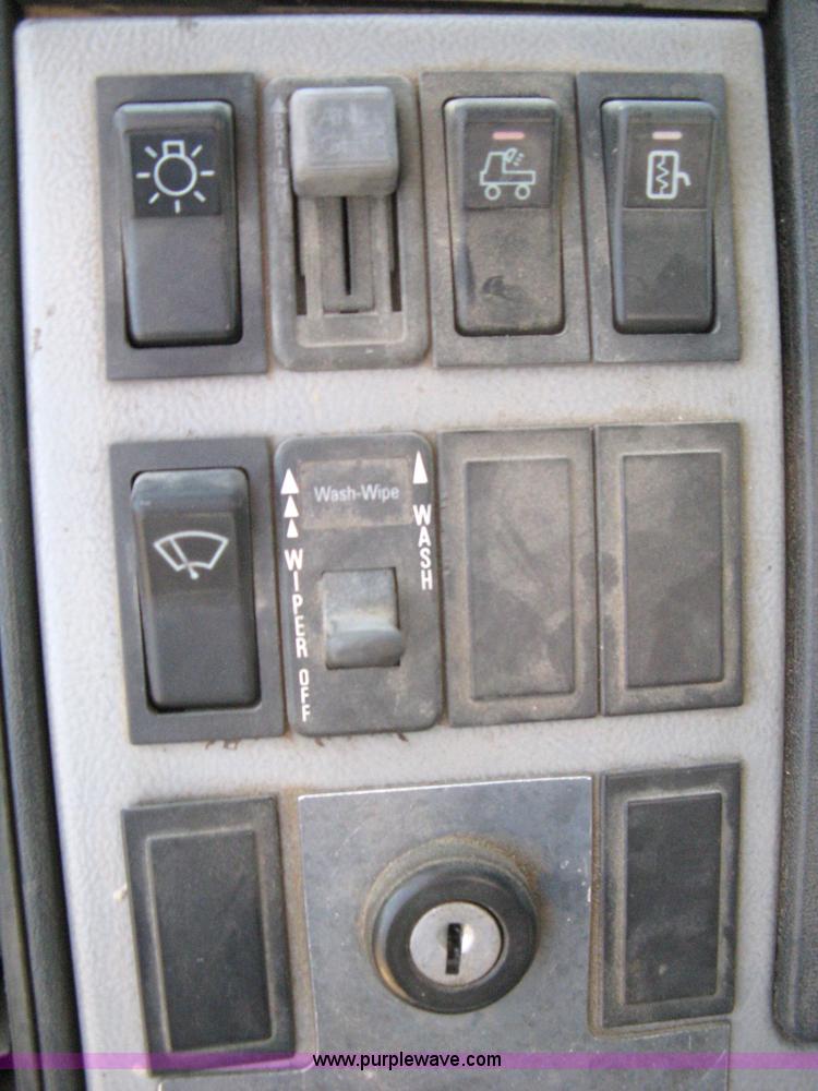 image for item 8210 1997 Freightliner FL70 business class dump truck