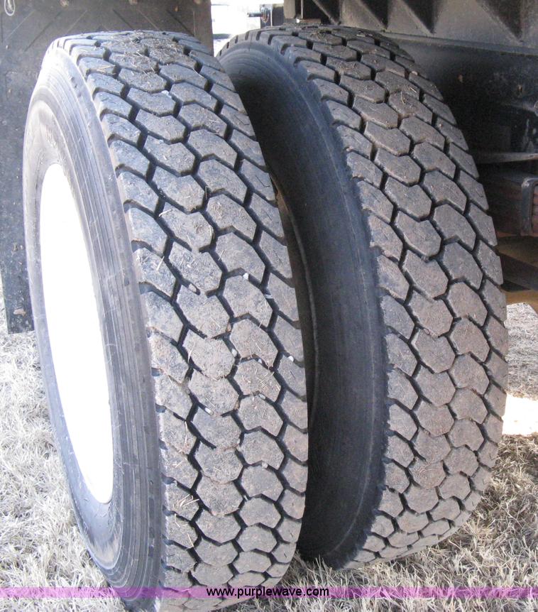 image for item 8210 1997 Freightliner FL70 business class dump truck