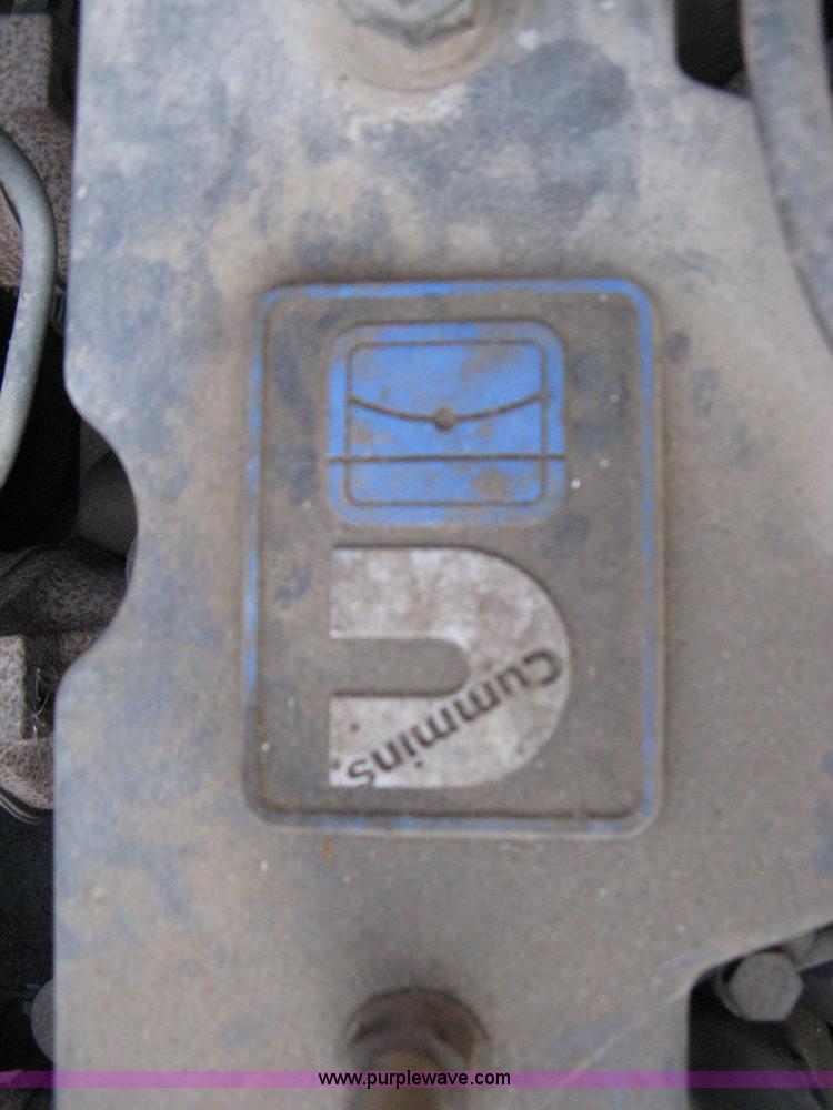 image for item 8210 1997 Freightliner FL70 business class dump truck