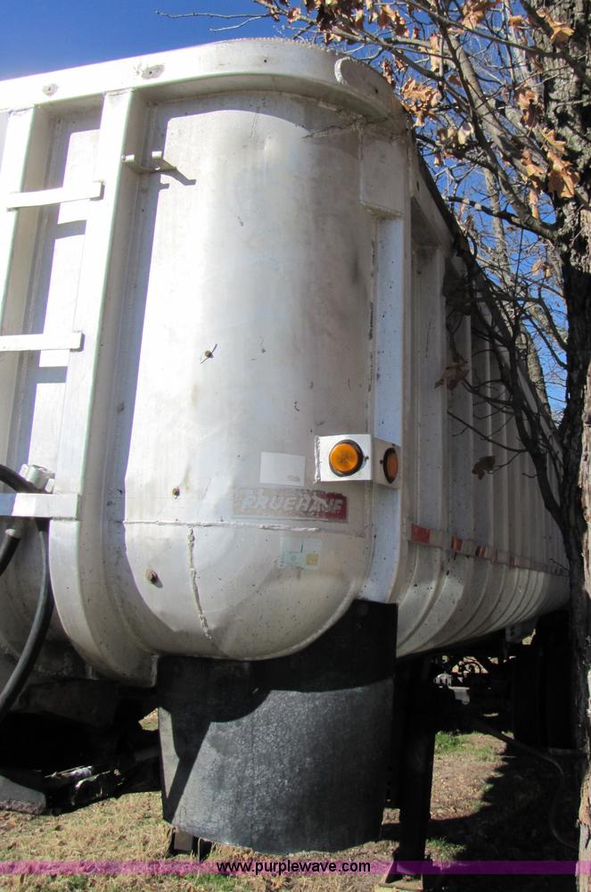 image for item 3544 1979 Fruehauf 30' aluminum end dump semi trailer