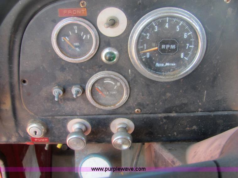 image for item 6934 1973 International Load Star 700 roll back truck