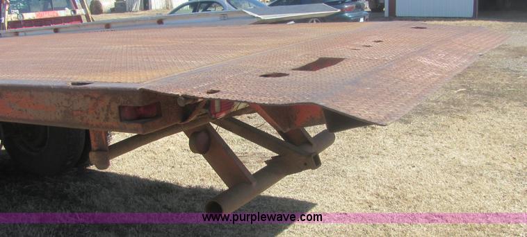 image for item 6934 1973 International Load Star 700 roll back truck