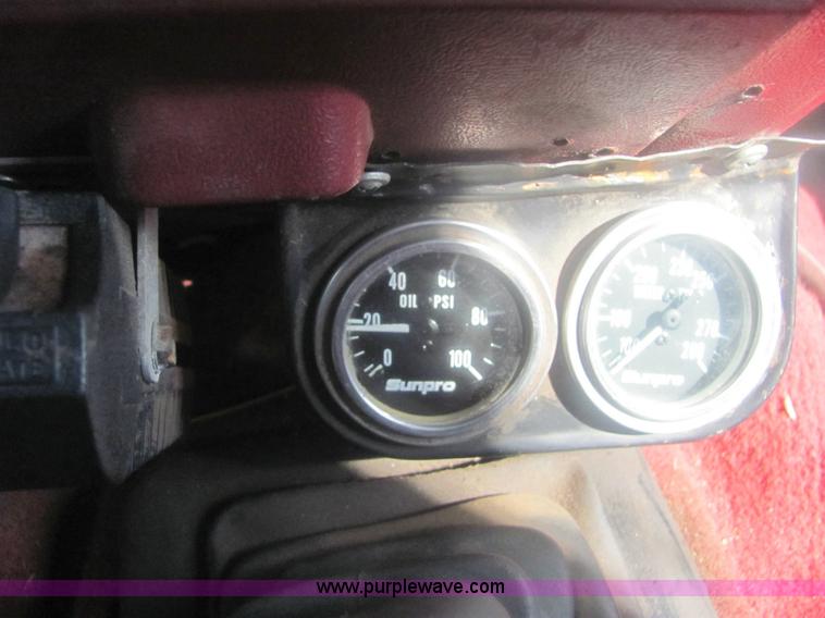 image for item 6936 1991 Ford F450 XLT Lariat roll back truck