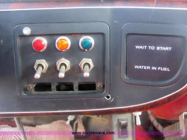 image for item 6936 1991 Ford F450 XLT Lariat roll back truck