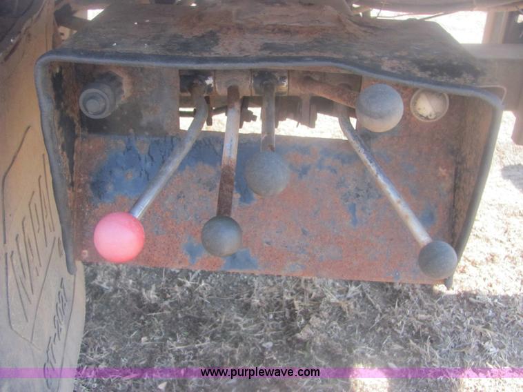 image for item 6936 1991 Ford F450 XLT Lariat roll back truck