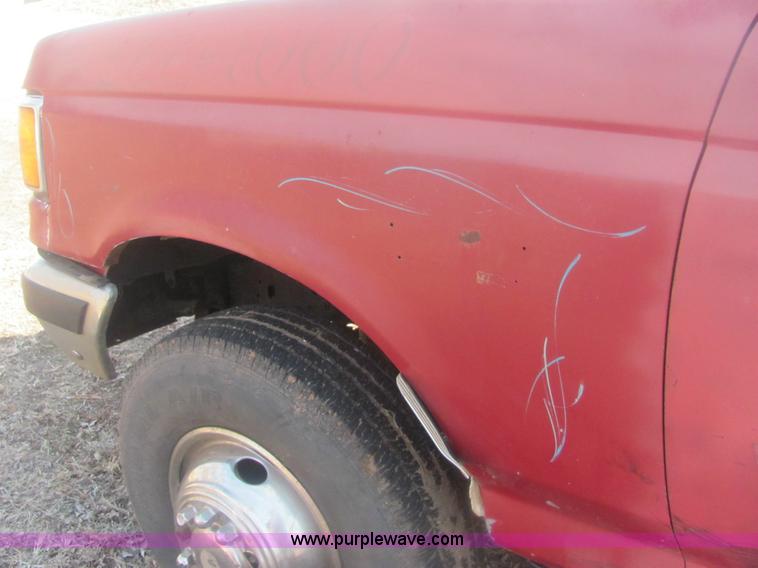 image for item 6936 1991 Ford F450 XLT Lariat roll back truck