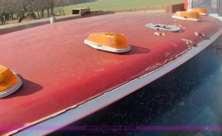 image for item 6936 1991 Ford F450 XLT Lariat roll back truck