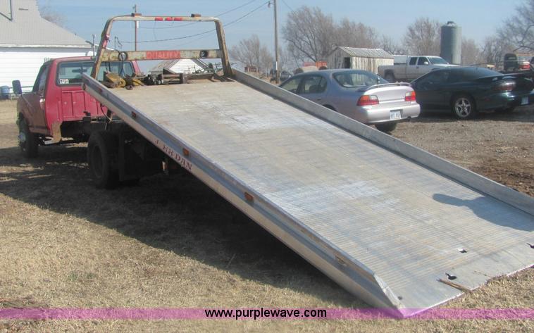 image for item 6936 1991 Ford F450 XLT Lariat roll back truck