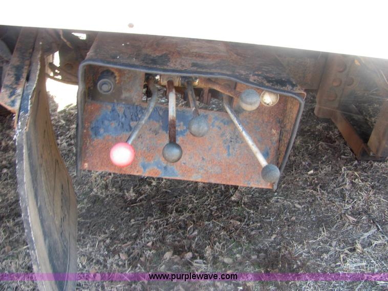 image for item 6936 1991 Ford F450 XLT Lariat roll back truck