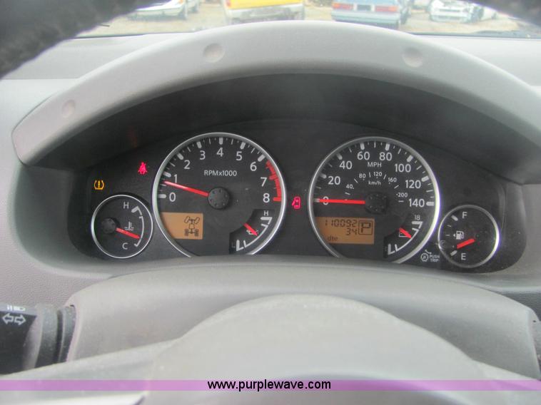 image for item 6959 2006 Nissan Frontier LE crew cab pickup truck