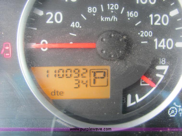 image for item 6959 2006 Nissan Frontier LE crew cab pickup truck