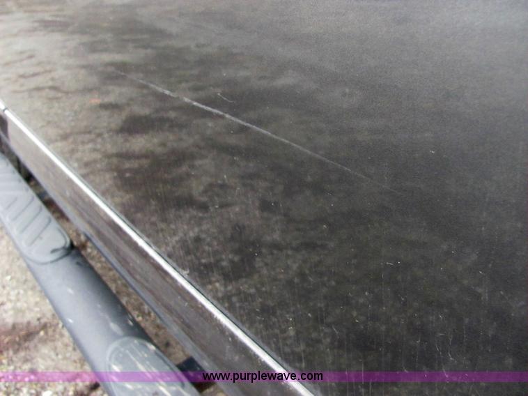 image for item 6959 2006 Nissan Frontier LE crew cab pickup truck