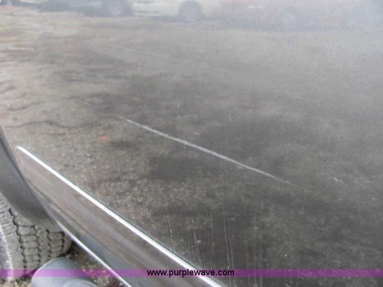 image for item 6959 2006 Nissan Frontier LE crew cab pickup truck