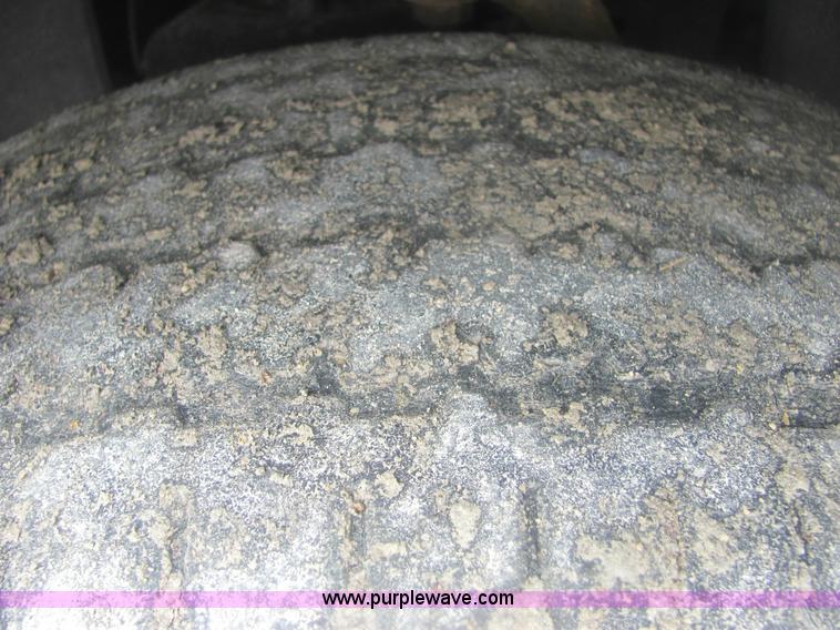 image for item 6959 2006 Nissan Frontier LE crew cab pickup truck