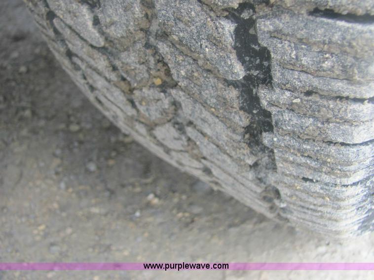 image for item 6959 2006 Nissan Frontier LE crew cab pickup truck