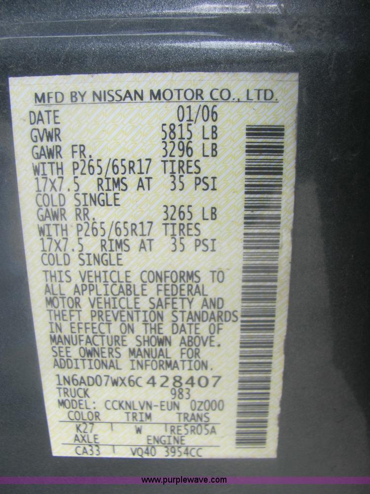 image for item 6959 2006 Nissan Frontier LE crew cab pickup truck