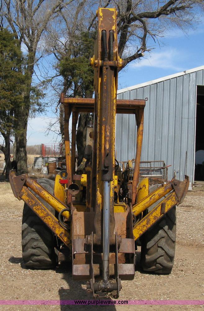 image for item 8239 Massey-Ferguson 30 tractor with loader and backhoe attachment