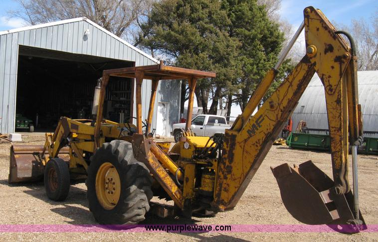 image for item 8239 Massey-Ferguson 30 tractor with loader and backhoe attachment