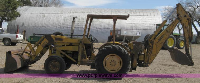 image for item 8239 Massey-Ferguson 30 tractor with loader and backhoe attachment