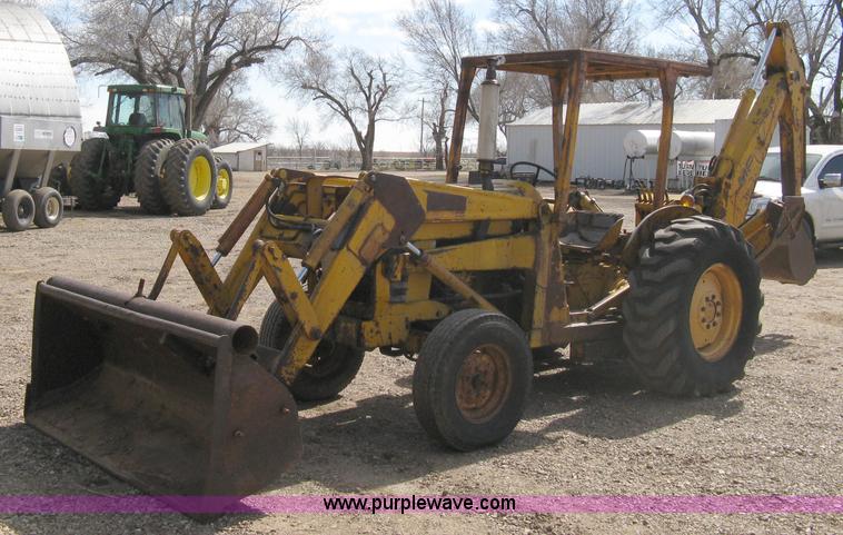image for item 8239 Massey-Ferguson 30 tractor with loader and backhoe attachment