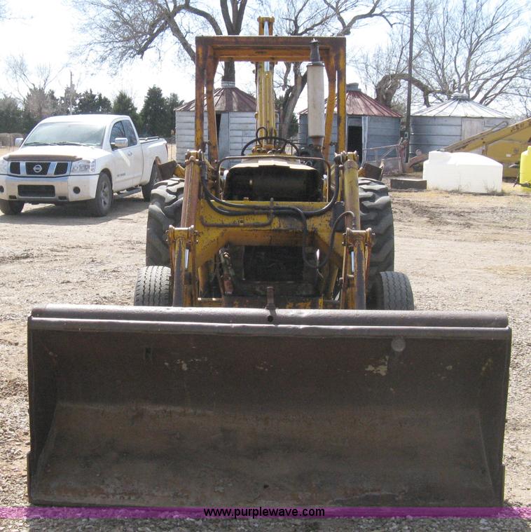 image for item 8239 Massey-Ferguson 30 tractor with loader and backhoe attachment
