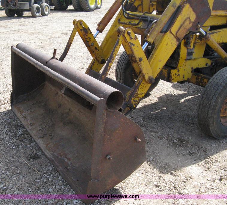 image for item 8239 Massey-Ferguson 30 tractor with loader and backhoe attachment