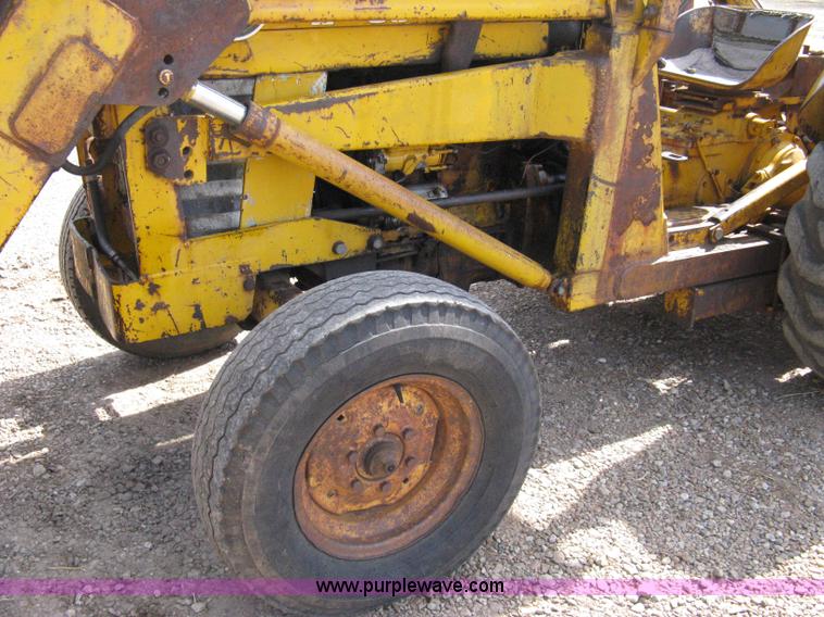 image for item 8239 Massey-Ferguson 30 tractor with loader and backhoe attachment