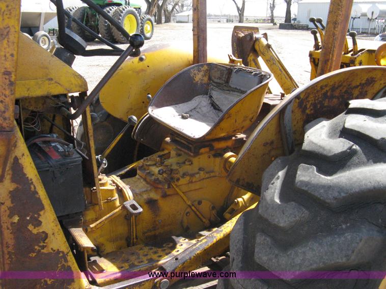 image for item 8239 Massey-Ferguson 30 tractor with loader and backhoe attachment