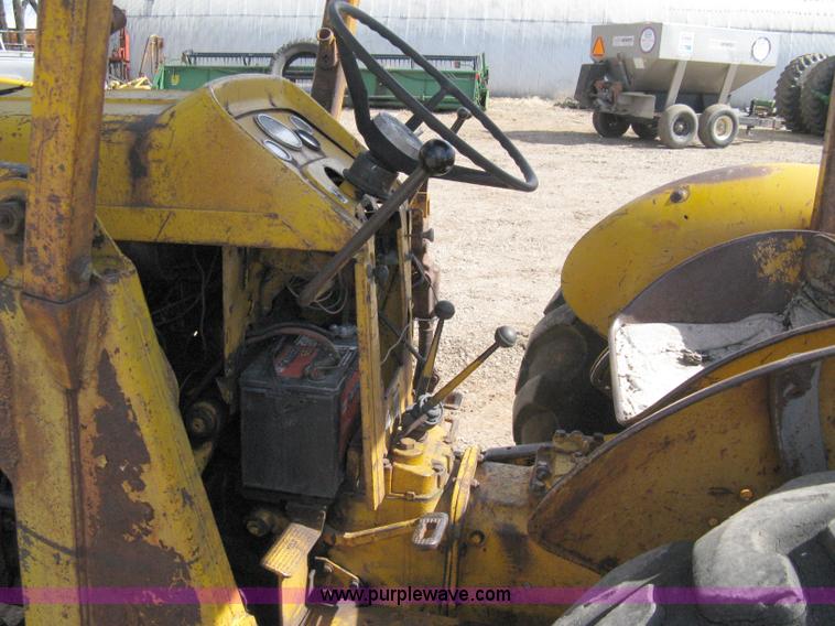 image for item 8239 Massey-Ferguson 30 tractor with loader and backhoe attachment