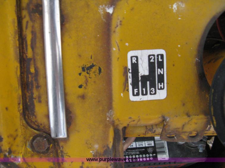 image for item 8239 Massey-Ferguson 30 tractor with loader and backhoe attachment