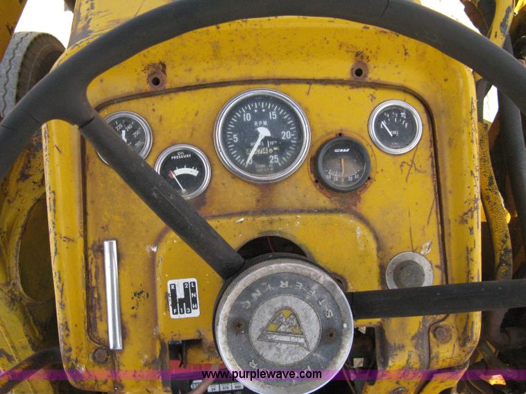 image for item 8239 Massey-Ferguson 30 tractor with loader and backhoe attachment