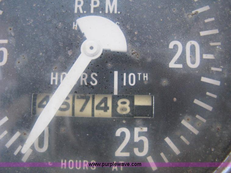 image for item 8239 Massey-Ferguson 30 tractor with loader and backhoe attachment