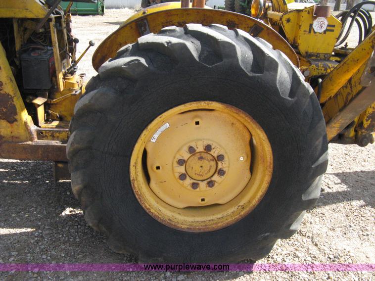 image for item 8239 Massey-Ferguson 30 tractor with loader and backhoe attachment