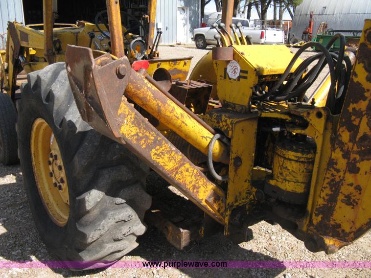 image for item 8239 Massey-Ferguson 30 tractor with loader and backhoe attachment