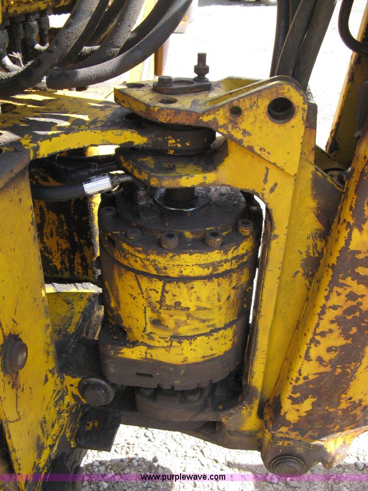 image for item 8239 Massey-Ferguson 30 tractor with loader and backhoe attachment