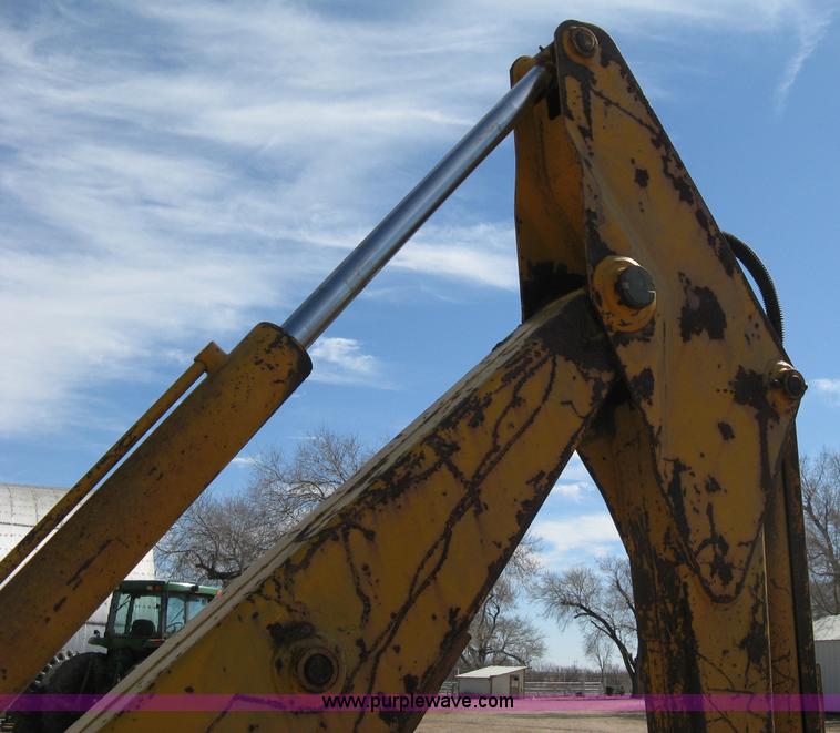 image for item 8239 Massey-Ferguson 30 tractor with loader and backhoe attachment