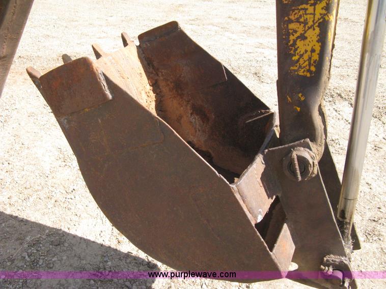 image for item 8239 Massey-Ferguson 30 tractor with loader and backhoe attachment