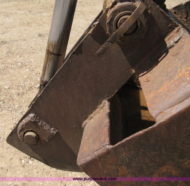 image for item 8239 Massey-Ferguson 30 tractor with loader and backhoe attachment