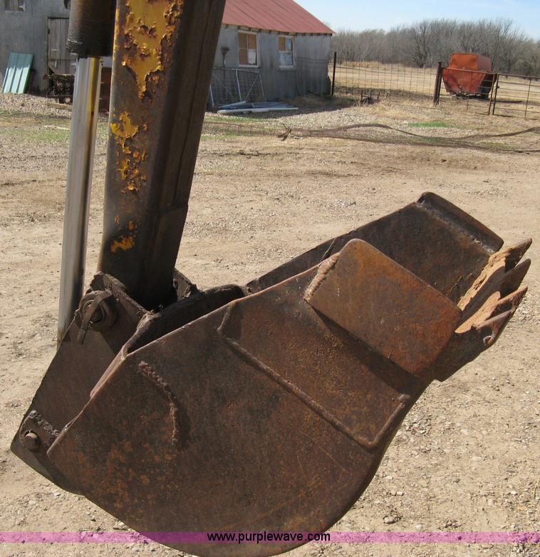 image for item 8239 Massey-Ferguson 30 tractor with loader and backhoe attachment