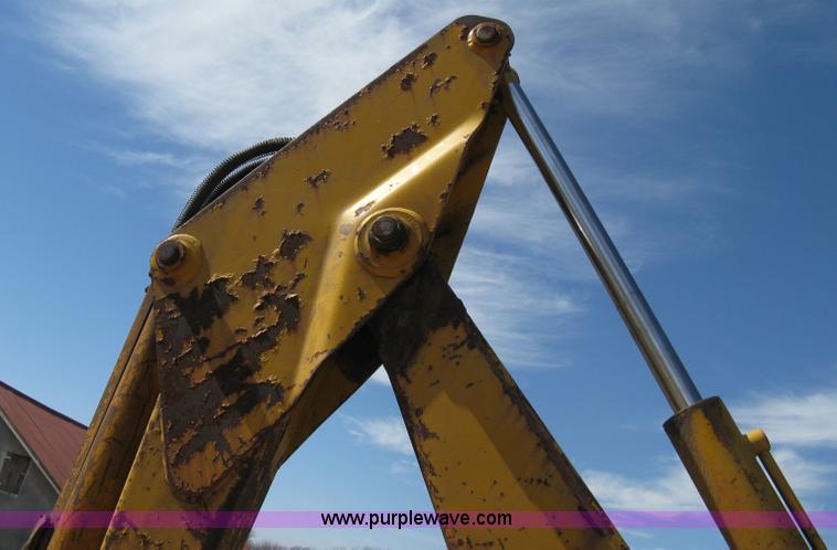 image for item 8239 Massey-Ferguson 30 tractor with loader and backhoe attachment