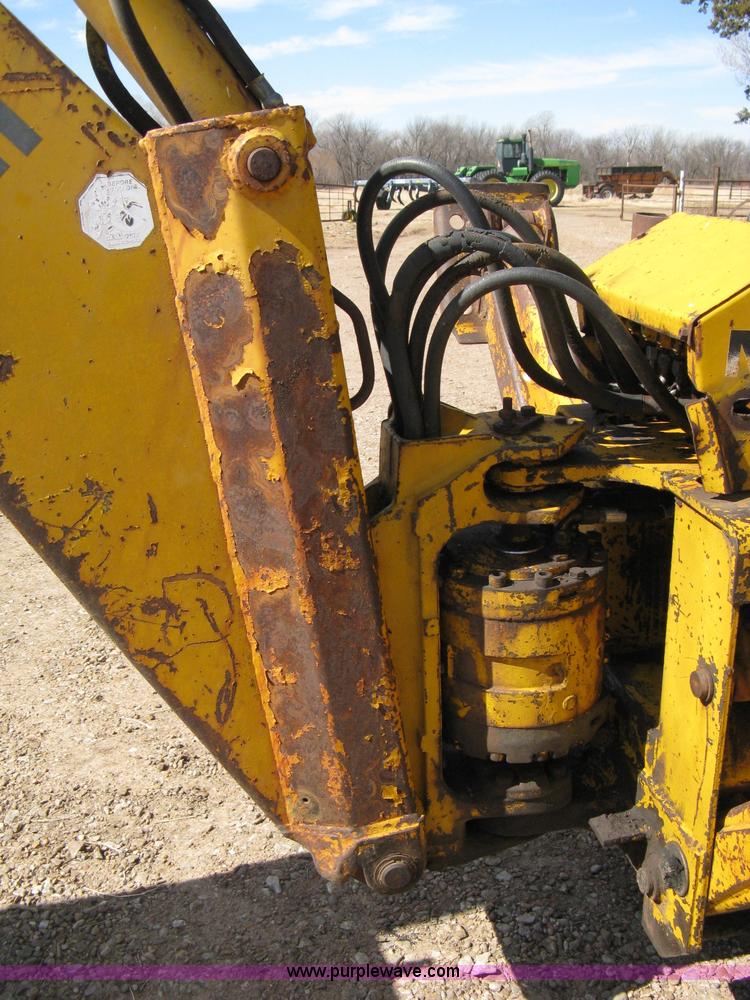 image for item 8239 Massey-Ferguson 30 tractor with loader and backhoe attachment