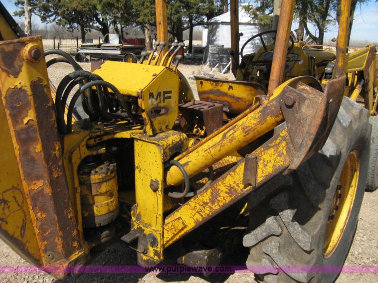 image for item 8239 Massey-Ferguson 30 tractor with loader and backhoe attachment