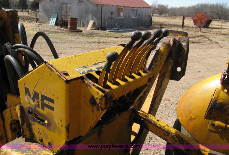 image for item 8239 Massey-Ferguson 30 tractor with loader and backhoe attachment