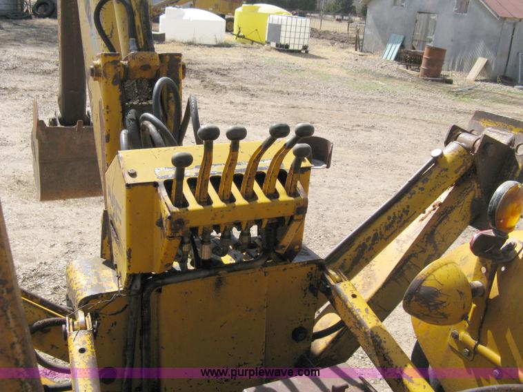 image for item 8239 Massey-Ferguson 30 tractor with loader and backhoe attachment