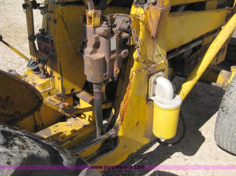 image for item 8239 Massey-Ferguson 30 tractor with loader and backhoe attachment
